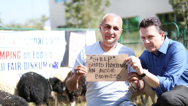 Australian Ugg boot maker Eddie Oygur and politician Nick Xenophon launch a demonstration outside the Decker Outdoor Corporation at their headquarters in Goleta, CA over the rights to the name 