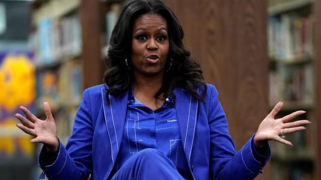 In her memoir, Becoming, former US first lady Michelle Obama speaks about the jarring effect being thrust into the spotlight had on her. Picture: Jim Young/AFP