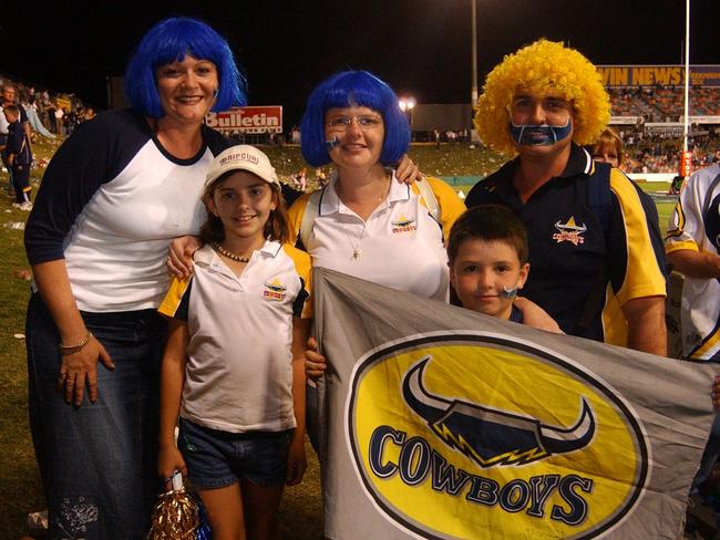 Heather Taylor with Allanah Griffiths, Cameron Griffith, Seimon Griffiths and Jason Griffith, all into the spirit of the Cowboys win. Pic Evan Morgan