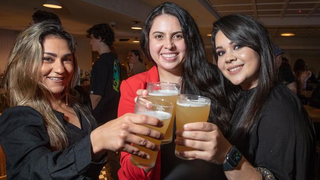 Dani Barona (left), Angela Osorio (centre) and Kate Alfonso enjoy catch-up drinks at The Clock in Surry Hills. Picture: Julian Andrews