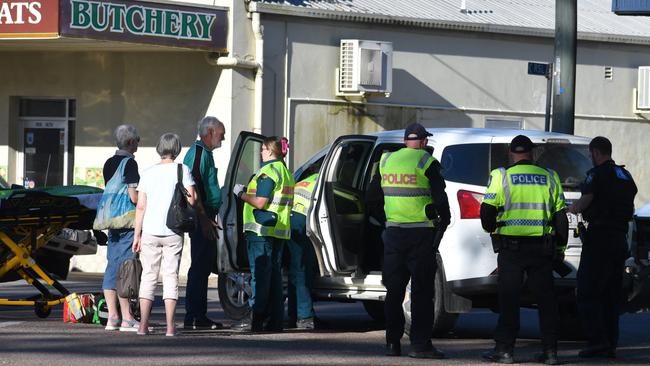 Emergency crews from Queensland Fire, Police and Ambulance responded to the incident on the corner of Haig Street and Herbert Street on the Bruce Highway in the middle of the Hinchinbrook town about 4pm. Picture: Cameron Bates