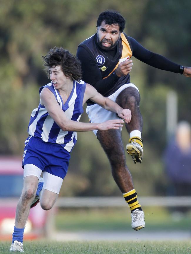 Wilfred Carter, right, playing for Wy Yung in 2012. Picture: Yuri Kouzmin