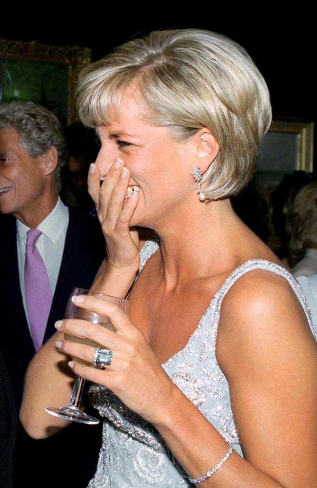 Princess Diana wearing the aquamarine ring Prince Harry has given to Meghan.