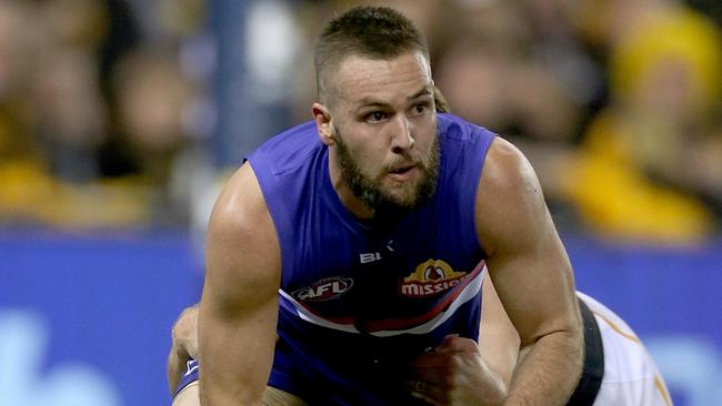 Max Gawn enjoys Matthew Suckling’s work. Picture: Mark Stewart