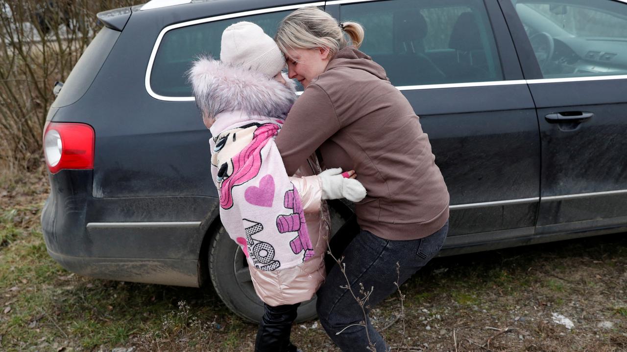 Anna Semyuk’s son and daughter crossed the border with a stranger. Picture: Reuters/Bernadett Szabo