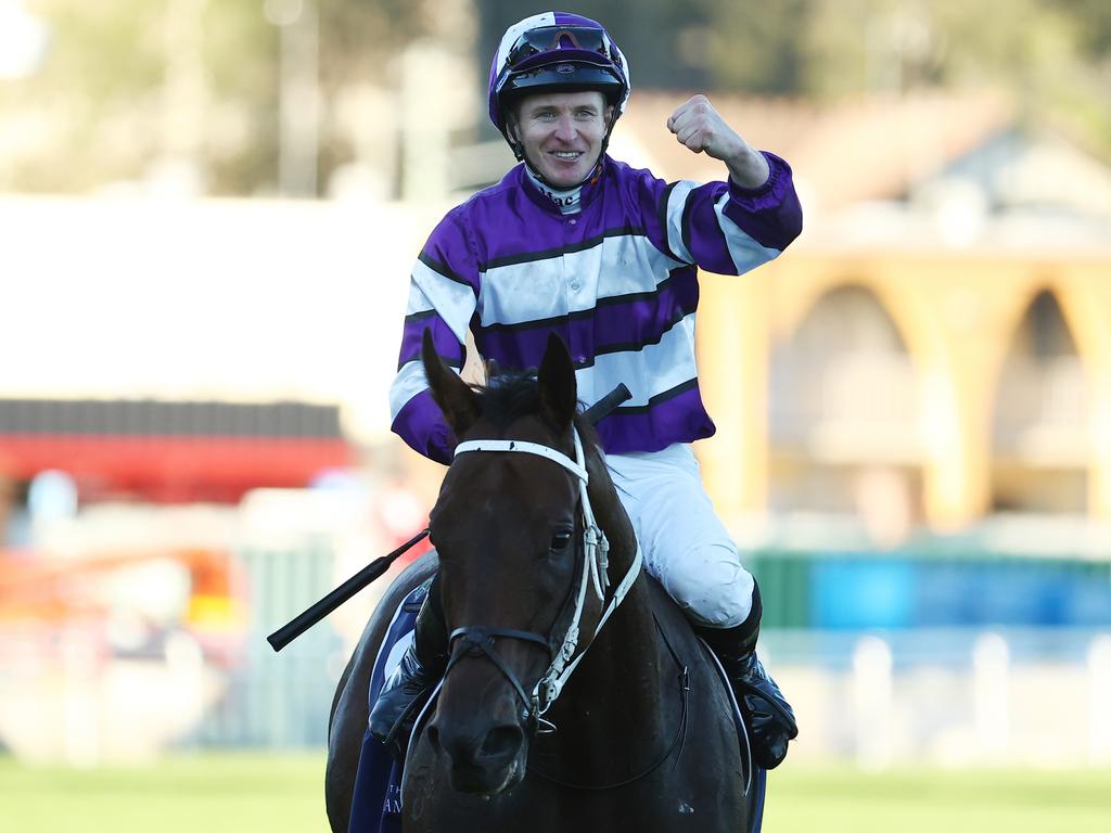 James McDonald on Riff Rocket after winning the ATC Australian Derby. Photo by Jeremy Ng/Getty Images