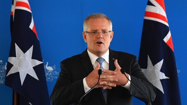 MELBOURNE, AUSTRALIA - MARCH 18: Prime Minister Scott Morrison addresses the Australia-Israel Chamber of Commerce on March 18, 2019 in Melbourne, Australia. The Prime Minister has announced an acceleration to the Safer Communities programme, with $55 million in community safety grants, with priority to be given to religious schools, places of religious worship and religious assembly. Grants from $50,000 to $1.5 million will provide for safety enhancements such as CCTV cameras, lighting, fencing, bollards, alarms, security systems and public address systems. The additional funding is in response to the deadly shooting attacks on two mosques in Christchurch on Friday, 15 March which killed 50 people. (Photo by Quinn Rooney/Getty Images)