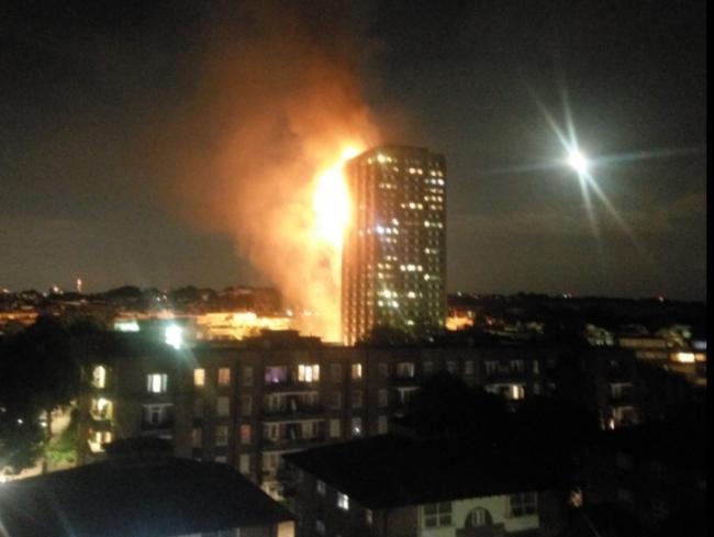 A shot of the apartment block fire in Latimer Road, London shortly after it broke out. Picture: @gorankrav / Twitter