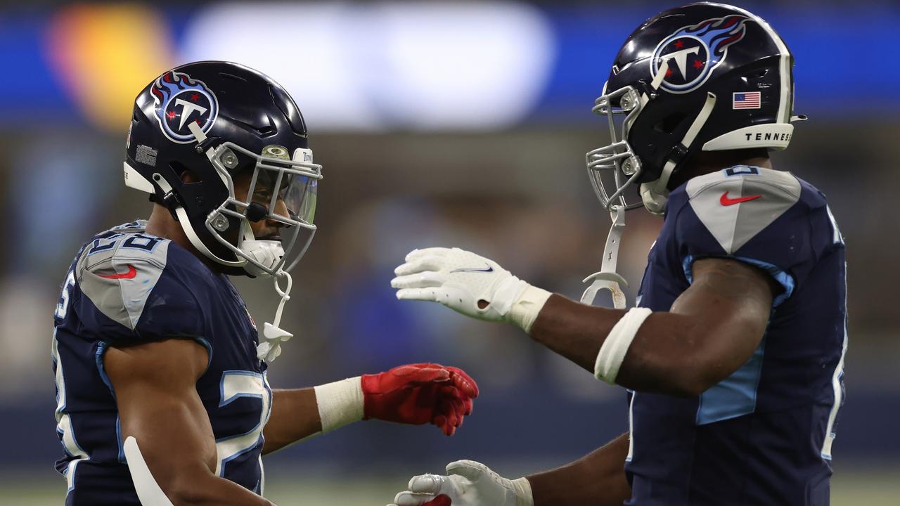 INGLEWOOD, CALIFORNIA - NOVEMBER 07: Adrian Peterson #8 of the Tennessee Titans reacts after rushing for a touchdown against the Los Angeles Rams with Jeremy McNichols #28 during the fourth quarter at SoFi Stadium on November 07, 2021 in Inglewood, California. (Photo by Harry How/Getty Images)