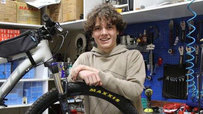 BIKE TECHNICIAN: With aspirations to be a world class mountain bike athlete, Year 10 Woodlawn student Oscar Murchison, 15, said he really loved undertaking a week's work experience as a bike mechanic with Harris Cycles. Photo: Alison Paterson