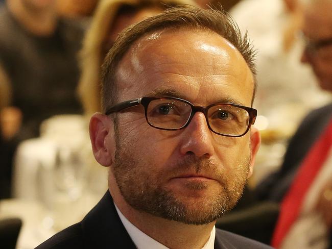 Greens MP Adam Bandt listening to ACTU Secretary Sally McManus address the National Press Club in Canberra. Picture Kym Smith