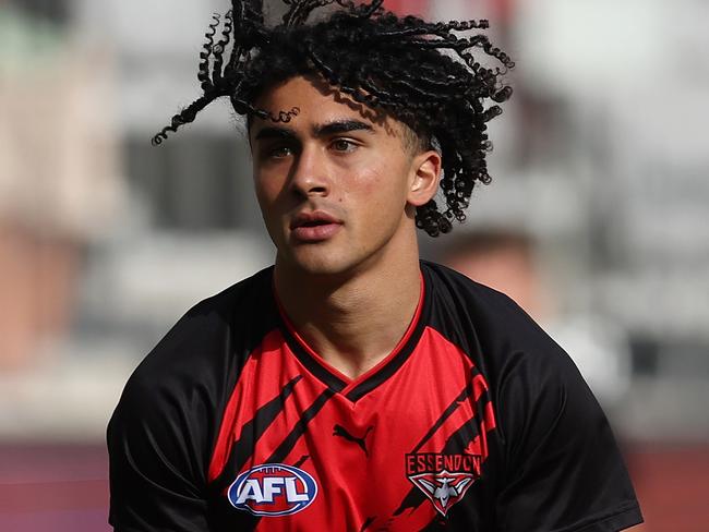 PERTH, AUSTRALIA - APRIL 18: Isaac Kako of the Bombers warms up before the round six AFL match between West Coast Eagles and Essendon Bombers at Optus Stadium, on April 18, 2025, in Perth, Australia. (Photo by Paul Kane/Getty Images)