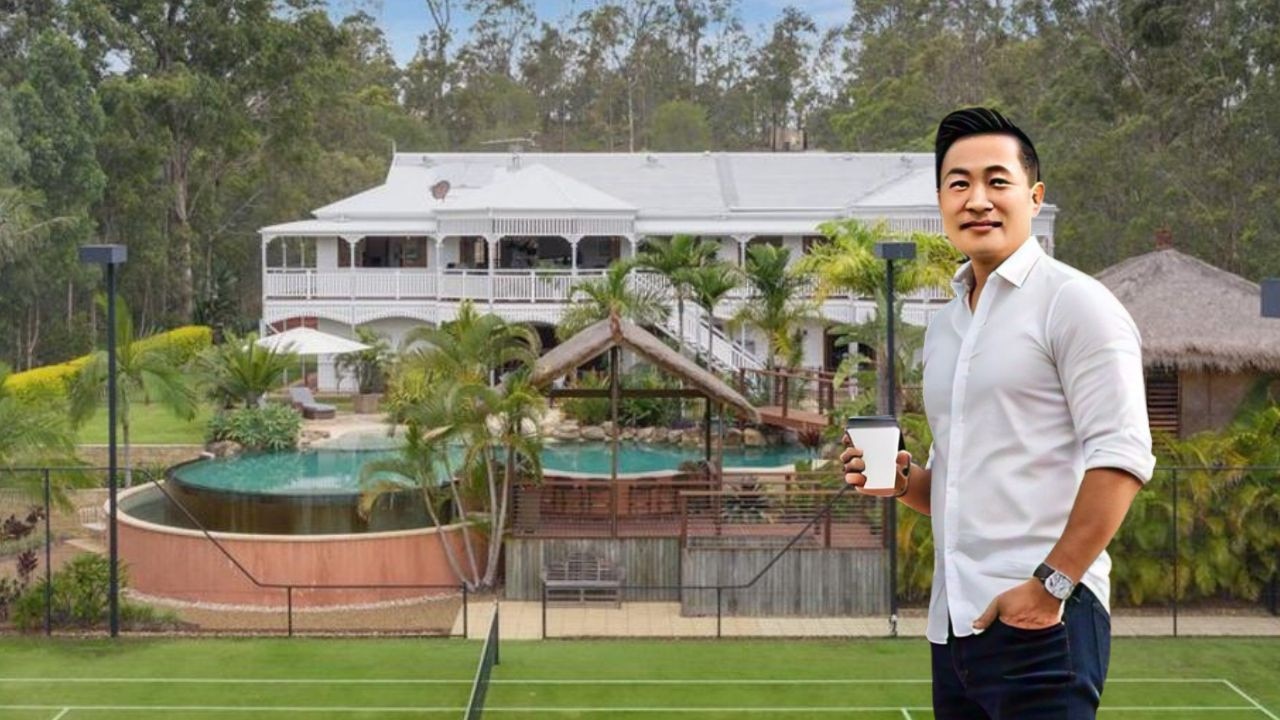 A Queenslander style house on the hill in The Gap. Person’s image is AI generated.