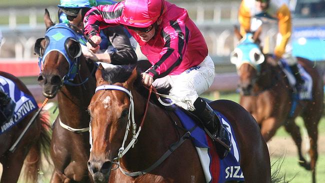 Chris Munce riding Sizzling to victory in the Group 1 TJ Smith Stakes (now JJ Atkins) in 2012. Picture: Jono Searle