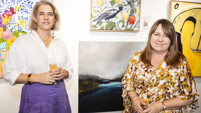 Finalists Abbie White (left) and Leisa O'Gorman with Leisa's work Mist (centre, bottom) at The Toowoomba Gallery for The Next Big Thing art prize and exhibition, Friday, March 1, 2024. Picture: Kevin Farmer