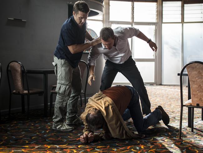 Action-packed ... Joel Edgerton, Jai Courtney and Tom Wilkinson in a scene from Felony.