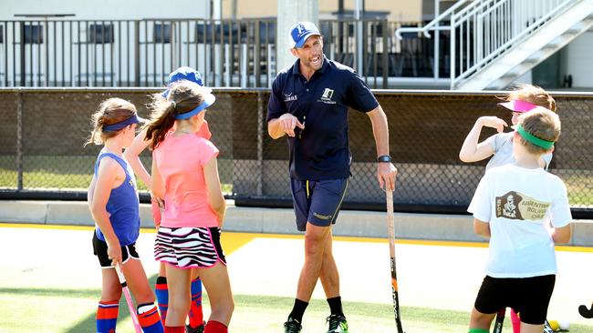 Knowles coaching kids at the Easts hockey club. Picture: Richard Walker