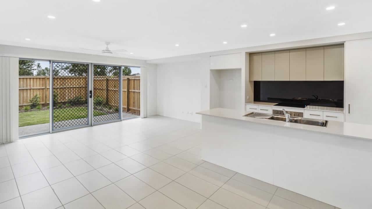 A similar layout to this open plan kitchen may greet future residents.