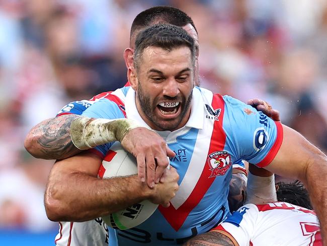 SYDNEY, AUSTRALIA - APRIL 25: James Tedesco of the Roosters is tackled during the round eight NRL match between the Sydney Roosters and St George Illawarra Dragons at Allianz Stadium on April 25, 2025, in Sydney, Australia. (Photo by Cameron Spencer/Getty Images)