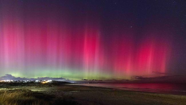 Moana Beach in South Australia lit up with the Aurora Australis on May 11. Picture: Ben Clark Imagery