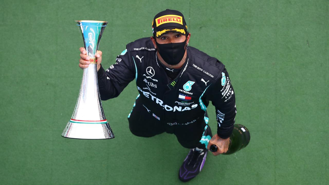Lewis Hamilton celebrates after winning the Hungarian Grand Prix.