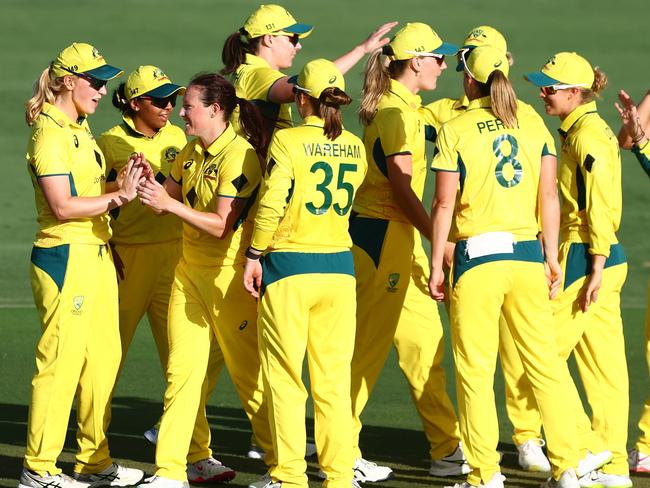 BRISBANE, AUSTRALIA - DECEMBER 05: Megan Schutt of Australia celebrates a wicket during game one of the Women's One Day International Series between Australia and India at Allan Border Field on December 05, 2024 in Brisbane, Australia. (Photo by Chris Hyde/Getty Images)