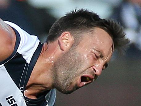 Geelong v Gold Coast Suns at Simonds Stadium. 19th April, Geelong Australia. Geelong's Jimmy Bartel subbed out of the game after he crashed into the knee of Gold Coast Suns' Michael Rischitelli Picture : George Salpigtidis