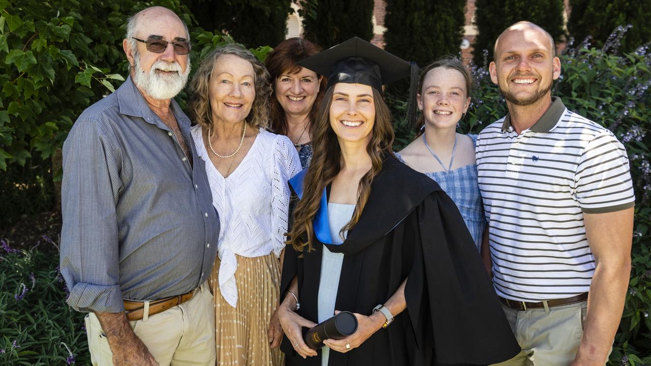 Bachelor of Nursing (Distinction) graduate Carla Jones with (from left) Darryl Jones, Jeane Jones, Jo Hamilton, Arleah Carrick and Dylan Jackson at the UniSQ graduation ceremony at Empire Theatres, Wednesday, December 14, 2022.