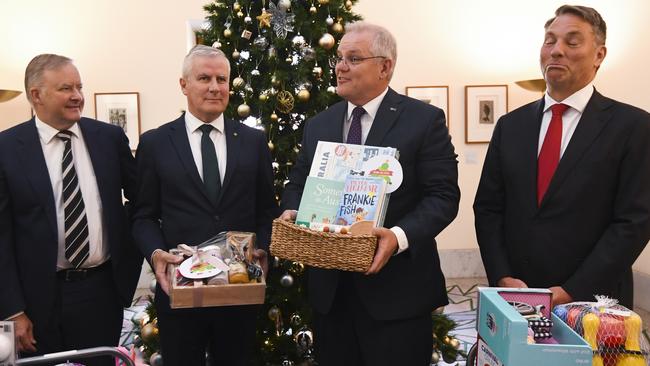 Anthony Albanese, Michael McCormack, Scott Morrison and Richard Marles at the Wishing Tree in Parliament House. Picture: Getty Images