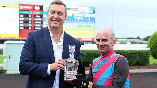 Trainer Tony Gollan, pictured with jockey Vlad Duric after Antino’s Group 2 Victory Stakes win at Eagle Farm, thinks his stable star can mix it with the nation’s best in Saturday’s Group 1 Memsie Stakes at Caulfield. Picture: Grant Peters / Trackside Photography