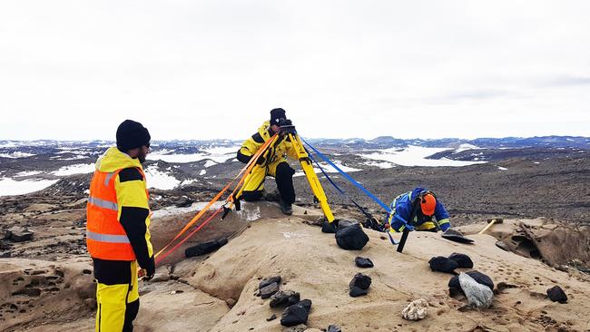 Surveyors work on the new runway. Picture: AAD