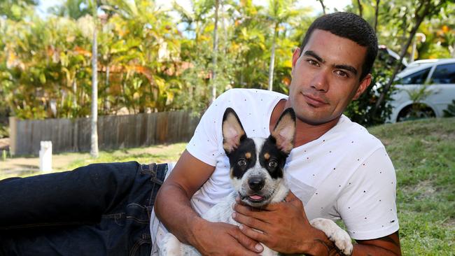 Thomas Bartlett pictured with Angus the cattle dog puppy involved in the incident. Picture Mike Batterham