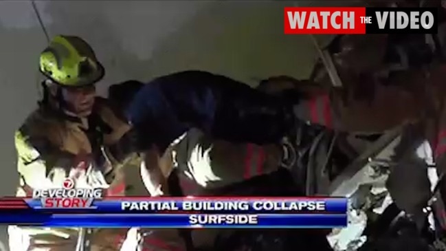 Rescue workers search for survivors after a building collapse in Florida