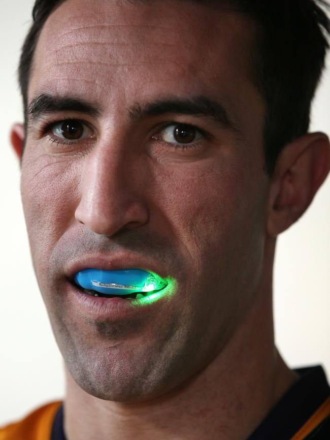 Ex-North Melbourne defender Michael Firrito wears the microchipped mouthguard. Picture: Michael Klein