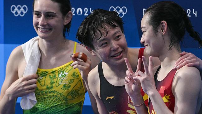 Maddison Keeney with Chinese divers Chen Yiwen and Chang Yani who won gold and bronze. Picture: AFP