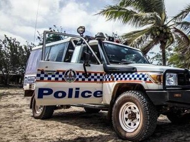 An NT Police vehicle in the outback