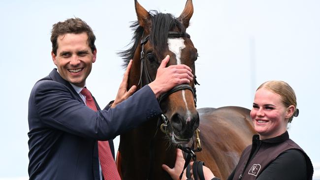 Matt Cumani gives Kingofwallstreet a pat after winning the Caulfield Classic. Picture: Vince Caligiuri/Getty Images