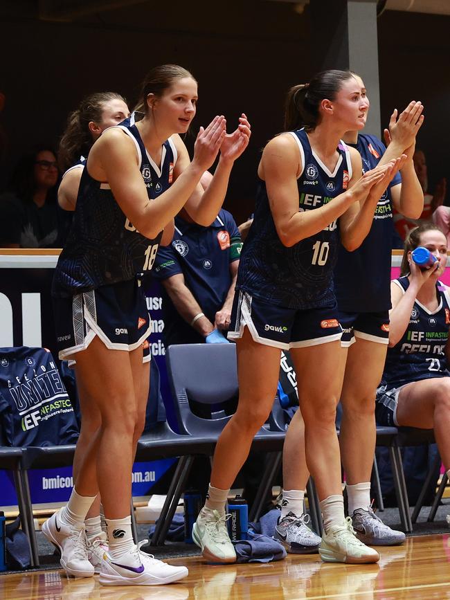 GEELONG, AUSTRALIA - OCTOBER 30: Tanielle Knight of Geelong United and Gemma Potter of Geelong United reacts during the round one WNBL match between Geelong United and Townsville Fire at The Geelong Arena, on October 30, 2024, in Geelong, Australia. (Photo by Kelly Defina/Getty Images)