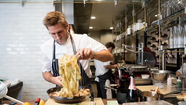 Curtis Stone working at his LA restaurant Maude to prepare home delivery meals during the COVID-19 lockdown. Picture: Supplied.