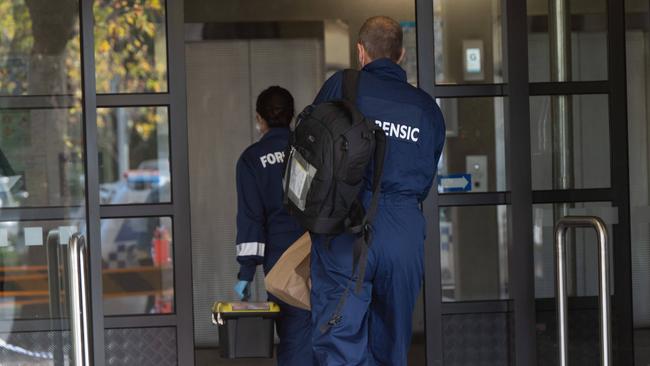 Forensic investigators were seen entering the building. Picture: Tony Gough