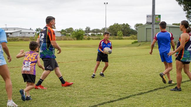 The Buchanan family play touch football for 12 teams across Mackay. From left are Takiah-Lani, 18, Cruz, 7, dad Reuben, Ryder, 11, Zeph, 13, and mum Sheril. Picture: Heidi Petith