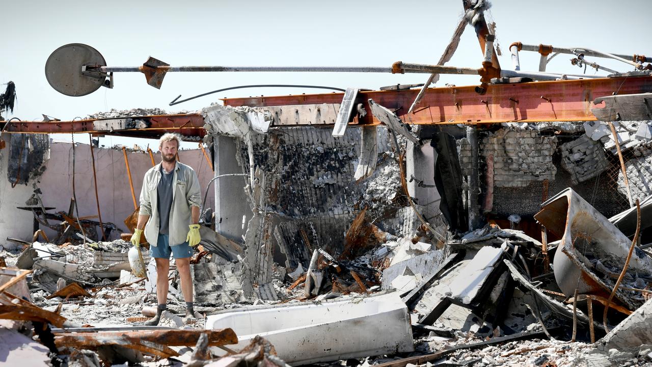 Ben Rigby in the ruins of his apartment in Pacific Palisades after it was destroyed by the Palisades wildfire. Photo: Jeff Rayner/Coleman-Rayner