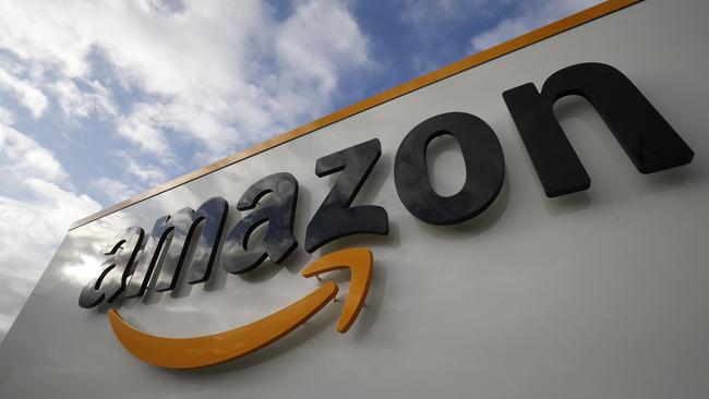 (FILES) In this file photo shows the Amazon logo at one of the company's centre in Bretigny-sur-Orge on November 28, 2019. - Jeff Bezos said February 2, 2021, he would give up his role as chief executive of Amazon later this year as the tech and e-commerce giant reported a surge in profit and revenue in the holiday quarter. (Photo by Thomas SAMSON / AFP)