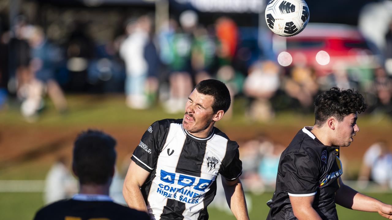 Beau Partridge (left) of Willowburn and Harrison Searle of West Wanderers in FQPL Men Darling Downs Presidents Cup football at West Wanderers, Sunday, July 24, 2022. Picture: Kevin Farmer