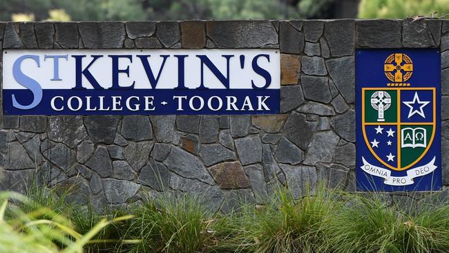 Signage is seen at St Kevin's College in Toorak, Melbourne, Thursday, February 20, 2020. Court action by a teacher has put more pressure on St Kevin's College in Melbourne after the school's headmaster resigned following a child-grooming scandal. (AAP Image/Erik Anderson) NO ARCHIVING