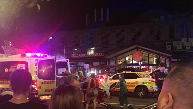 An injured man was treated by ambulance officers on the scene before being taken to hospital. Picture: Josh Spasaro