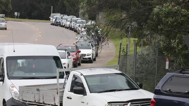 Locals flocked to sandbagging stations as Cyclone Alfred approaches the Gold Coast. The Reedy Creek depot staff were busy and people had a two-hour wait and the queue snaked around the surrounding streets. Picture Glenn Hampson