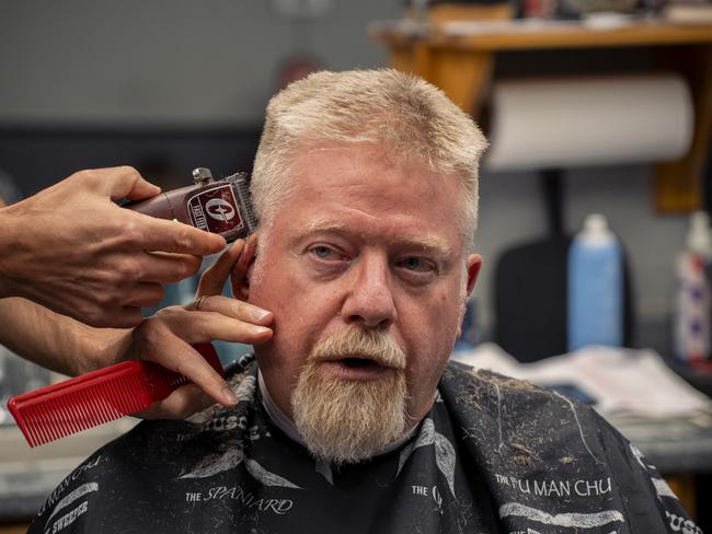 ** FOR NETWORK USE - UNITED MATES SERIES ** Jim Alter has his hair cut at Downtown Barbershop in Sidney, Ohio on Thursday August 15, 2024. SIDNEY, OH-- On Thursday, August 15, 2024. Picture: Eli Hiller | The Daily Telegraph