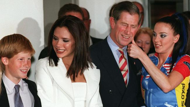 Prince Harry with Victoria, Prince Charles and Mel C. Picture: AFP