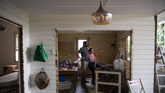 Tim Moores and Lucy Wise lost everything in the home they own in North Lismore after the worst flood on record hit the northern rivers town. Picture: Elise Derwin